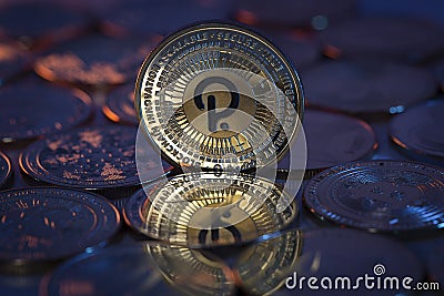 Polkadot DOT Crypto Coin placed on crypto altcoins and lit with orange and blue lights Editorial Stock Photo