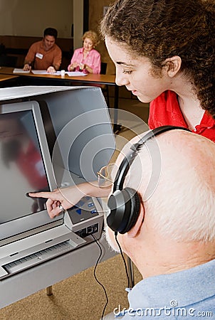 Poll Worker Helps Out Stock Photo