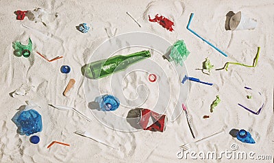 Polluted beach with plastic and glass waste Stock Photo