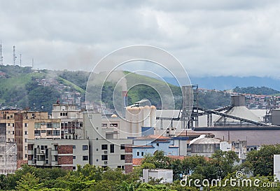 Polluted industrial city, with its Steel factory and smokestacks. Editorial Stock Photo