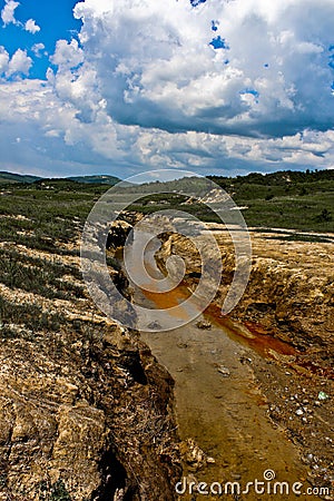 Polluted river in Buzau, Romania Stock Photo