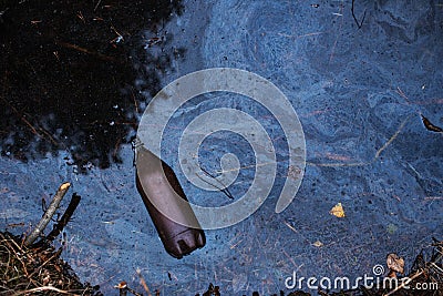 Polluted river. plastic in water. harm to ecology Stock Photo