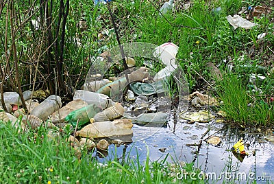 Environmental pollution. Plastic waste in water Stock Photo