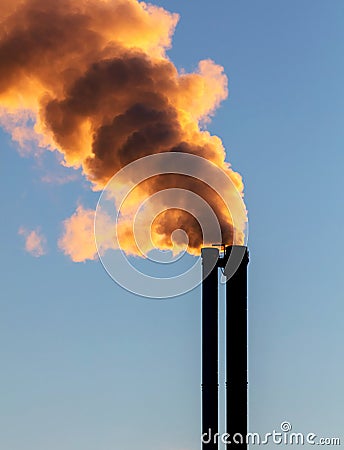 Pollution Coming From Factory Smokestacks Stock Photo