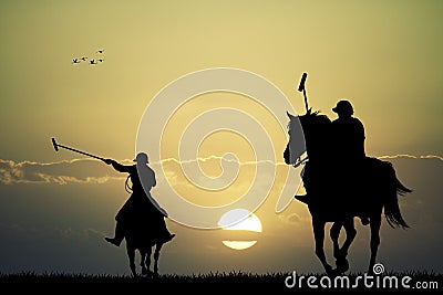 Polo players at sunset Stock Photo