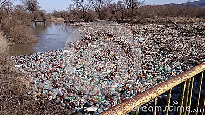 Polution with plastic waste on a river Stock Photo