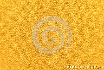 Polyester synthetic fabric top view, macro fiber yellow fabric Stock Photo