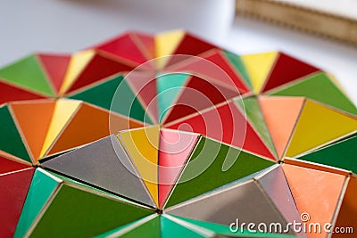 polygonal surface with colored triangles, tessellation of a three-dimensional floor with colored polygons. decoration with Stock Photo