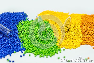 Polymeric dye. Colorant for plastics. Pigment in the granules. Stock Photo