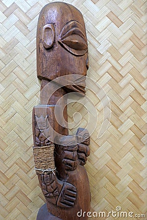 Polynesian female figurine wooden carving sculpture Rarotonga Co Stock Photo