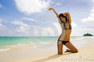 Polynesian girl in a black bikini Stock Photo
