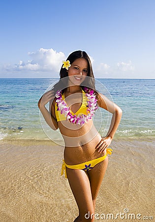 Polynesian girl in a yellow bikini Stock Photo