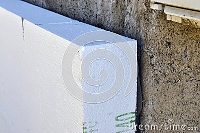 Polystyrene insulation on house wall closeup Stock Photo