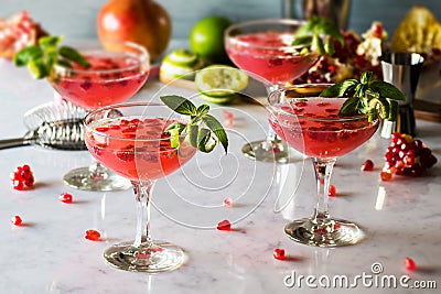 Pomegranate Basil Martini or Gin Smash Cocktail Stock Photo