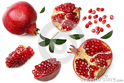 pomegranate fruit with seeds and green leaves isolated on white background top view Stock Photo