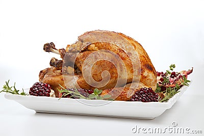 Pomegranate Glazed Roasted Turkey on White Stock Photo