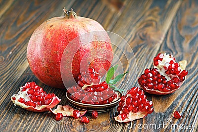 Pomegranate juice with ripe fresh punica granatum fruits Stock Photo
