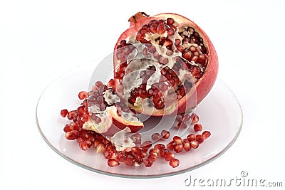 Pomegranate on a plate Stock Photo