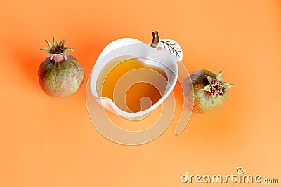 Pomegranate, plate of honey and Shofar horn for Rosh Hashanah. Stock Photo
