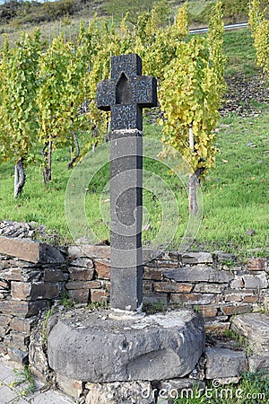 Pommern, Germany - 10 21 2020: Ancient cross at the roadside Stock Photo