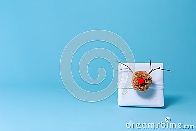 Pompom reindeer gift box Stock Photo