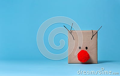 Pompom reindeer gift box Stock Photo