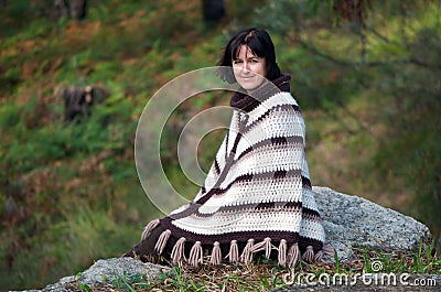 Poncho woman Stock Photo