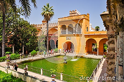 Pond with fountan in Seville Alcazar gardens, Andalusia, Spain Editorial Stock Photo