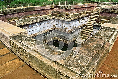 A pond in front of Hucchimalli Gudi Mad Malli`s temple , Aihole, Bagalkot, Karnataka, India. Stock Photo