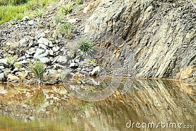 Pond by Geoheritage Site of Ultramafic Rocks Stock Photo