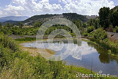 Pond, Mountains and Green in Helena Montana Stock Photo