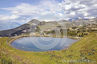 Pond in the mountains of La Plagne in France Stock Photo
