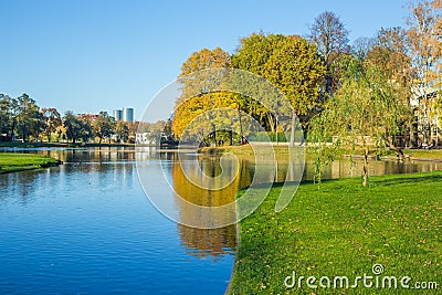 Pond in Riga, district agenskalsns. Autumn, yellow tree leaves, Editorial Stock Photo