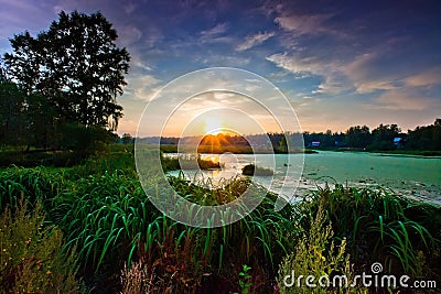 Pond at sunset Stock Photo