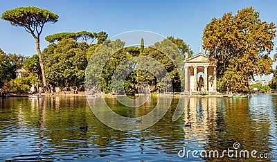 Pond with Temple of Aesculapius in gardens of Villa Borghese, Rome, Italy Stock Photo