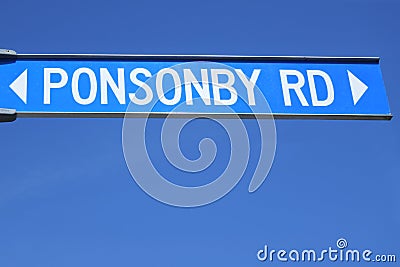 Ponsonby road sign against blue sky Stock Photo