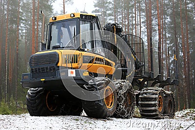 PONSSE Elk Forwarder in Foggy Winter Forest Editorial Stock Photo