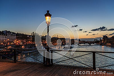 Pont des arts street lamp at night. Paris seine bridge with lantern. Morning river view Stock Photo