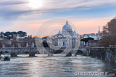 Ponte Sant Angelo- bridge over the Tiber river and St. Peter`s B Stock Photo