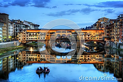 Ponte Vecchio bridge in Florence, Italy. Arno River at night Editorial Stock Photo