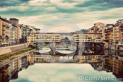 Ponte Vecchio bridge in Florence, Italy. Arno River, vintage Stock Photo