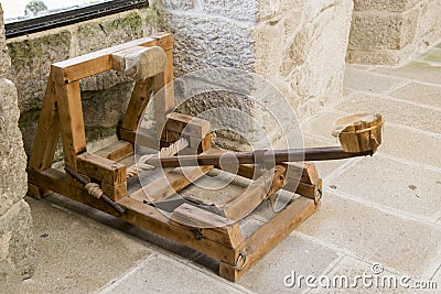 Catapult in a medieval castle Stock Photo