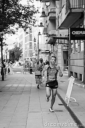 PONTEVEDRA, SPAIN - June 29, 2019: Marathon of 5 and 10 kilometers, to help victims of traffic accidents, through the streets of Editorial Stock Photo