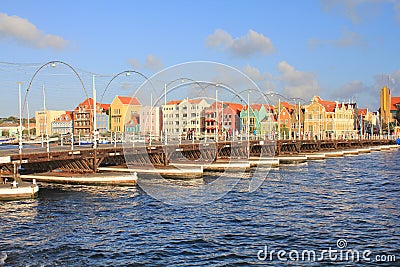 Pontoon bridge and waterfront with harbour and colorful houses in Willemstad, Caribbean. Editorial Stock Photo