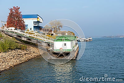 Poonton in Giurgiu harbor, Danube river, Romania Stock Photo