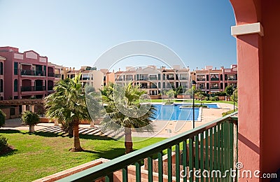 Pool area in a residential building complex in Cala Blava Editorial Stock Photo