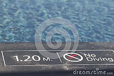 Pool depth warning Stock Photo