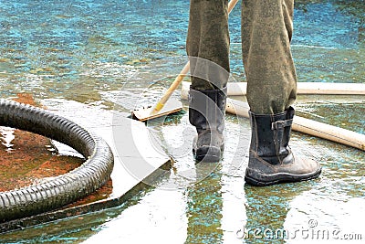Pool or fountain cleaner boots, brush removes debris from the surface, corrugated hose Stock Photo