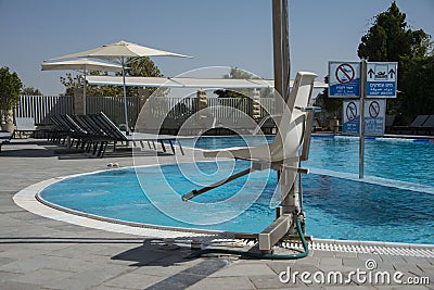 Pool with handicap machine to the water Stock Photo