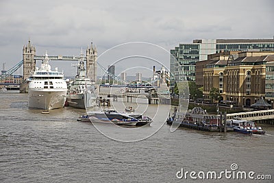 Pool of London ships berthed near Tower Bridge UK Editorial Stock Photo